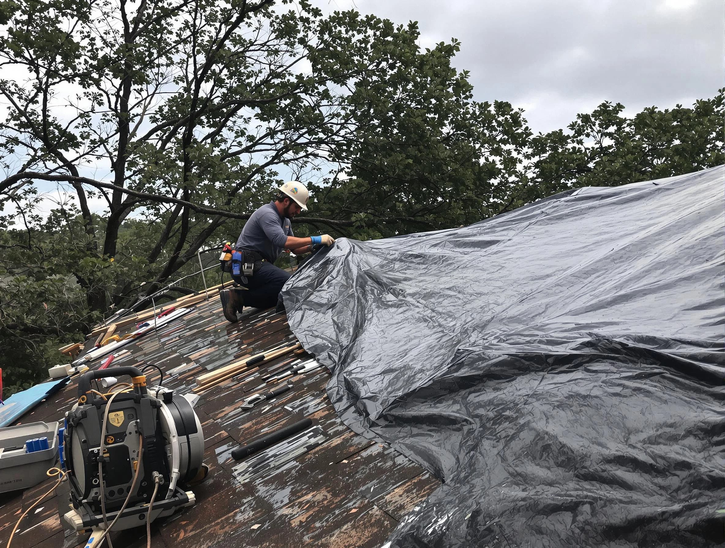 Cleveland OH Roofers responding to an emergency roof repair call in Cleveland, OH